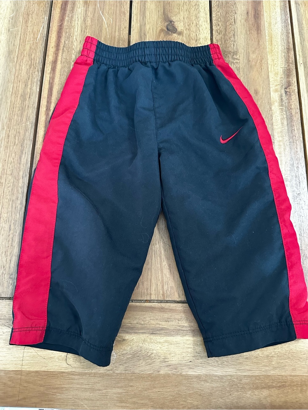Nike Kids Black and Red Athletic wind breaker pants size 6-9 months